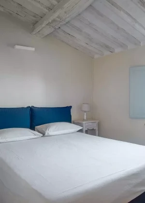 POMPANAETRUSCANVILLAS-TOSCANA-POMPANA-BEDROOM2-WPRELAIS-ORIZ